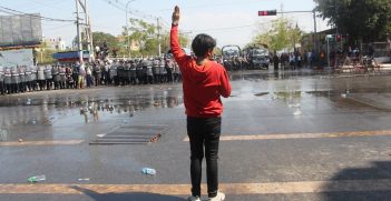 A protester flashes the three-finger salute during a protest against the military coup in Mandalay, Myanmar, Feb. 9, 2021. (Credit: VOA Burmese Service) https://bit.ly/3HLUx9C