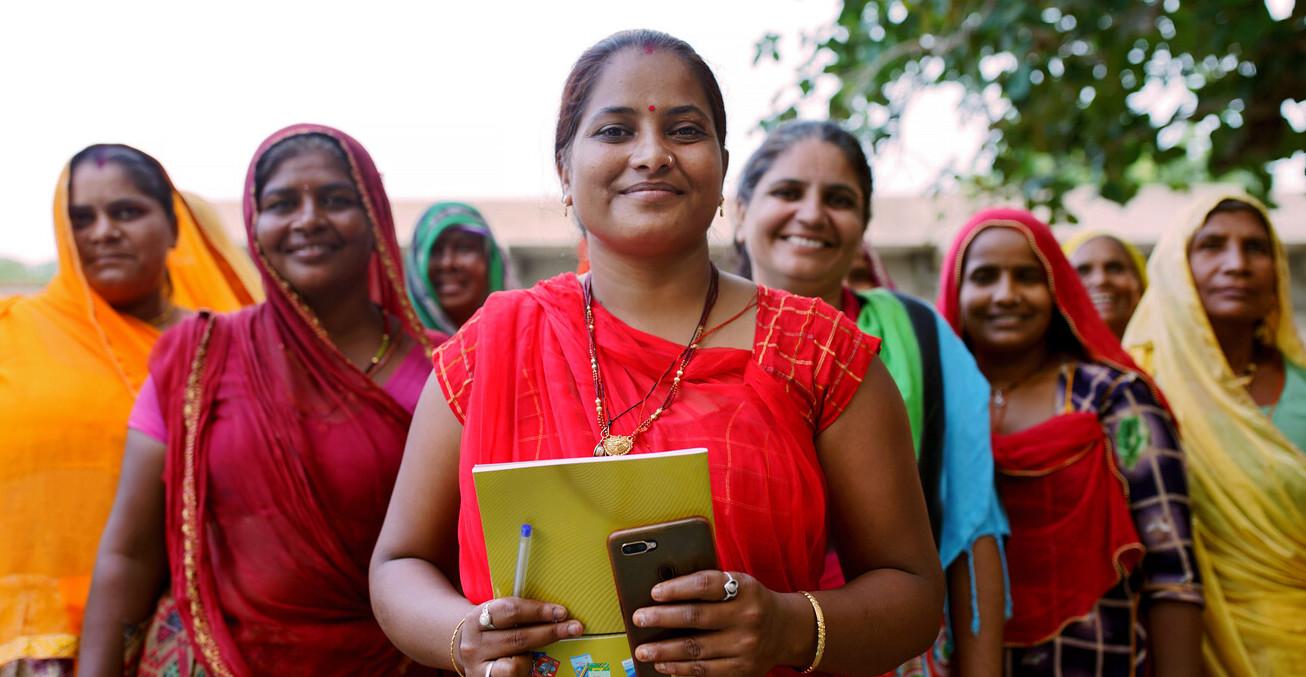 Anju Salvi (in the middle), president of the Sakhi Sangam Women’s Federation, photographed with UN Women’s Second Chance Education programme beneficiaries in 2018. Source: UN Women, Flickr, https://bit.ly/3vvfS41