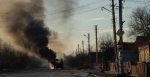 A bus burns as Russia invades Ukraine on Feb. 24, 2022, on a road from Kharkiv to Kyiv.  Source: Yan Boechat/VOA https://bit.ly/3HzooS1