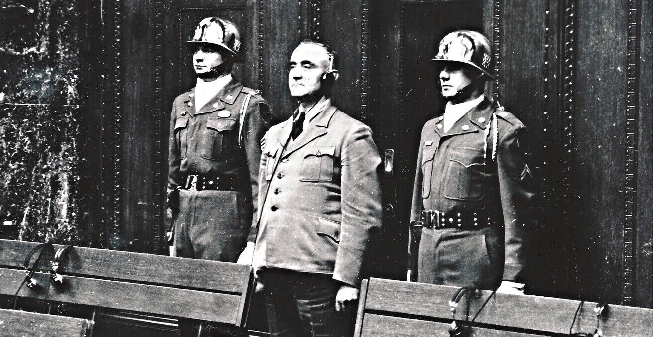 SS Lt. Gen. Gottlob Berger, chief of the SS Main Office and convicted of responsibility for the murder of Allied prisoners of war, hears the Tribunal sentence him to 25 years in prison in 1949.
Source: photolibrarian Flickr, https://bit.ly/3u9gUkZ
