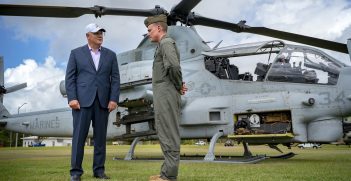 The Honorable Scott Morrison, the Prime Minister of Australia, speaks to U.S. Marine Corps Maj. David Femea, an aviation combat element operations officer and AH-1Z Viper pilot with Marine Rotational Force – Darwin, about aviation capabilities at Robertson Barracks, NT, Australia. Source: U.S. Marine Corps photo by Cpl. Lydia Gordon https://bit.ly/3JvHMjK