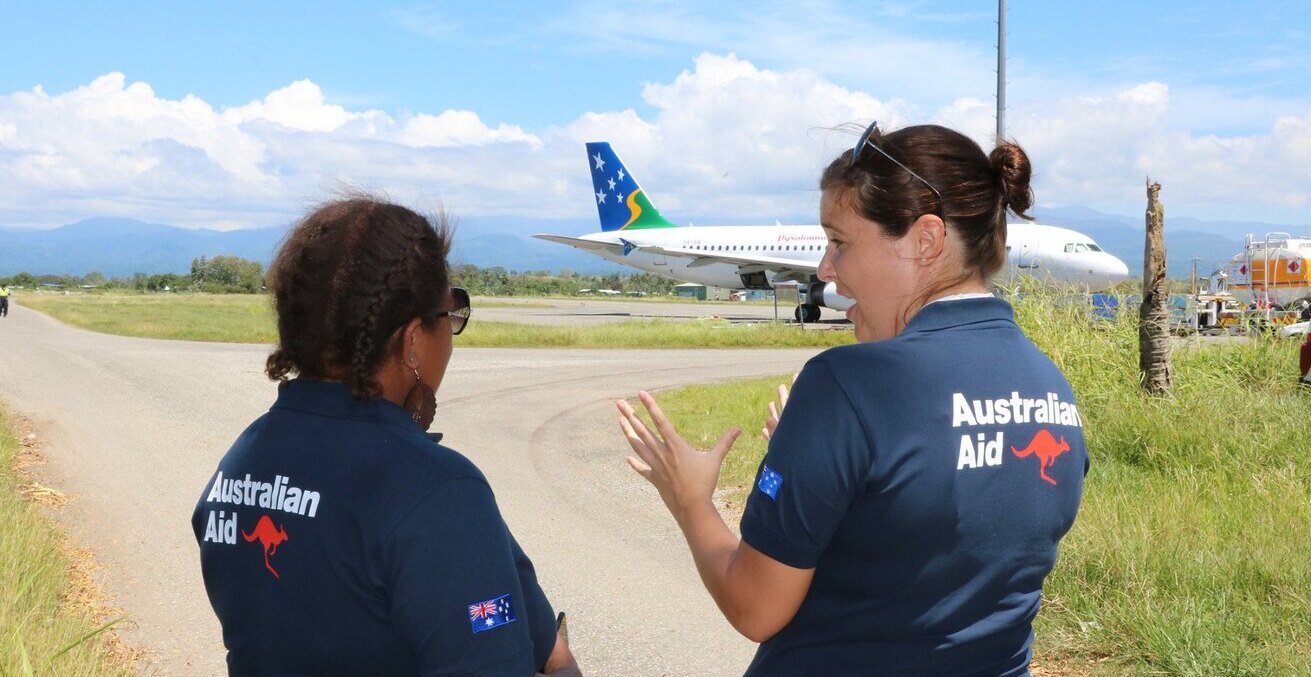 Staff from the High Commission greet the arrival of an Australian funded COVID-19 support package to Solomon Islands, April 2020.
Source: DFAT, Flickr, https://bit.ly/3lVrHKM