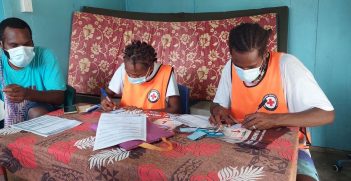 Vanuatu Red Cross volunteers registering individuals for Health Ministry vaccination campaign.
Source: ICRC