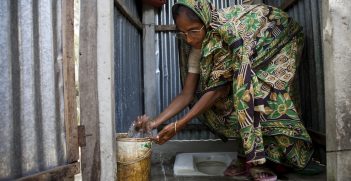 Joygum Begum washes her hands. Source: Conor Ashleigh for AusAID. https://bit.ly/3y4gwWv