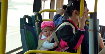 Mother and baby on the bus China. Source: Chris/http://bit.ly/41KhswA