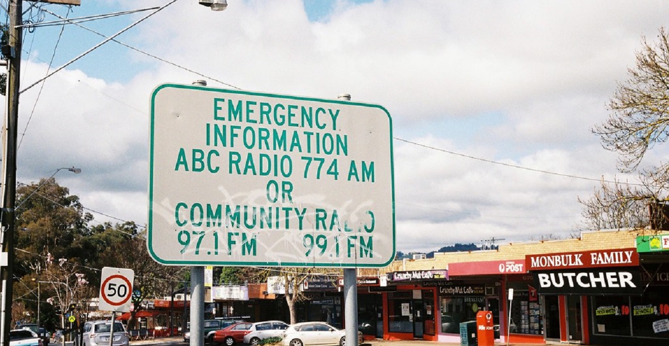 Sign - Emergency Information ABC Radio 774 AM or Community Radio 97.1 FM, 99.1 FM. Source: Matthew Paul Argall/ http://bit.ly/3ZZ4Saz