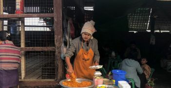Daw Thandar Oo runs a stall in Maungdaw, Rakhine State, selling fried noodles and vermicelli salad. Photo supplied by the ICRC.