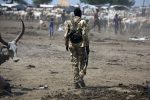 A solider walking towards a town in Sudan. Source: UNMISS / Eric Kanalstein/https://bit.ly/3oDeqeW