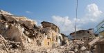 House surrounded by rubble. Source: http://surl.li/lirbq
