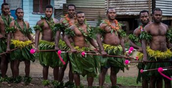 SAVUSAVU, Fiji (June 18, 2015) Fijian men prepare to dance  during a ceremony. Source: Defense Visual Information Distribution Service / https://t.ly/gTWlM