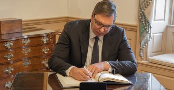 Serbian President Aleksander Vucic signs the guest book, at the Department of State, on March 2, 2020. Source: State Department photo by Freddie Everett/ https://t.ly/FPjEc