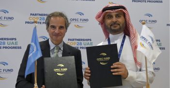 Rafael Mariano Grossi, IAEA Director-General together with OPEC Fund Director-General Abdulhamid Alkhalifa, signs the Practical Arrangement between the International Atomic Energy and the OPEC Fund on Cooperation in the Area of Climate Adaptation to enhance collaborative efforts by both entities to develop and implement joint projects on climate adaptation at the United Nations Climate Change Conference UNCCC held at the Expo City Dubai, United Arab Emirates. FAO Pavilion, 1 December 2023. Source: IAEA Imagebank / https://t.ly/vEIqX