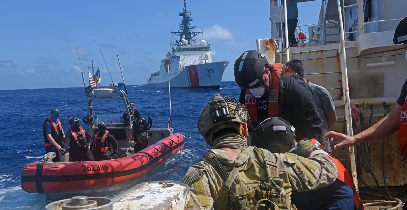 Crew members from Coast Guard Cutter Munro prepare to disembark after conducting a boarding of South Korean-flagged fishing vessel Dong Won in the South Pacific April 14, 2022, southwest of the Howland/Baker Islands, as part of Operation Blue Pacific. Source: Coast Guard News Flickr / https://t.ly/4bC73