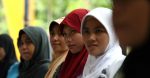 Women attend a training workshop. Source: Photo by Josh Estey, Department of Foreign Affairs and Trade / https://t.ly/gJmIq  